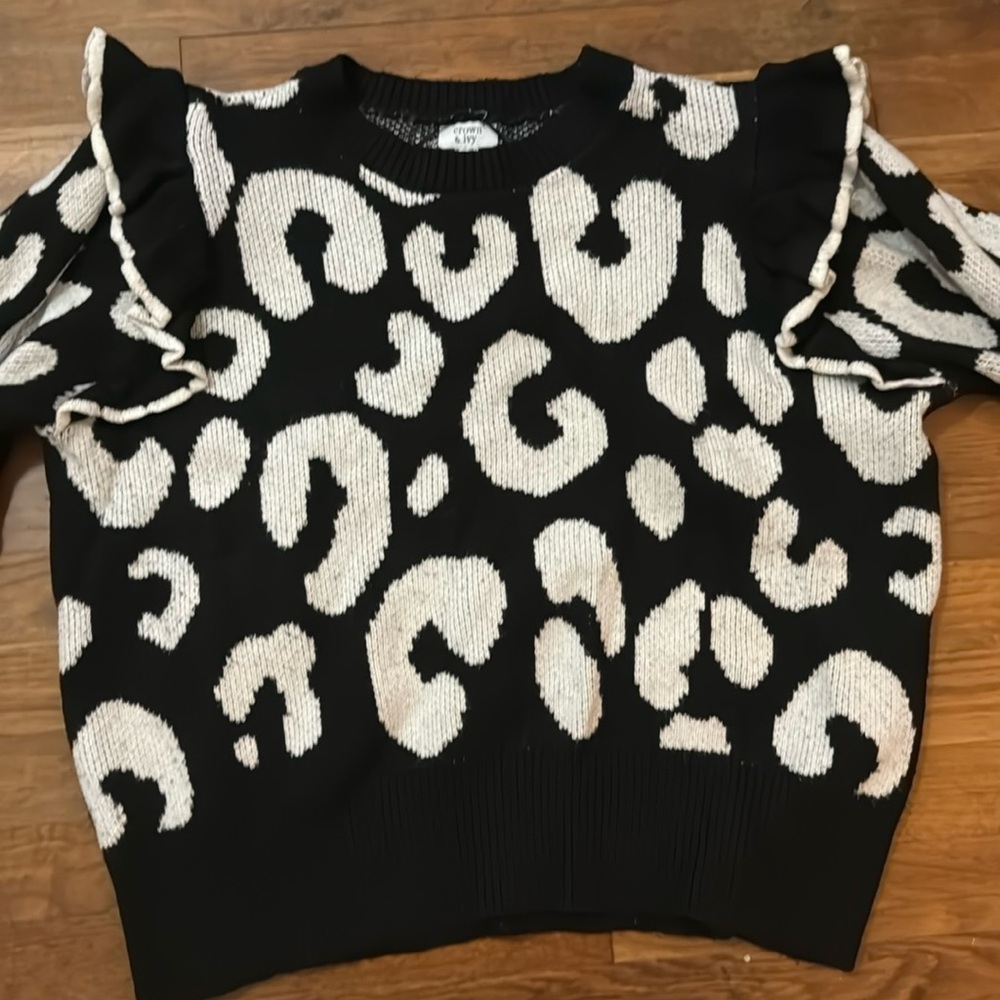 Black and white printed sweater.